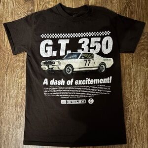 women’s brown car graphic tee with white print